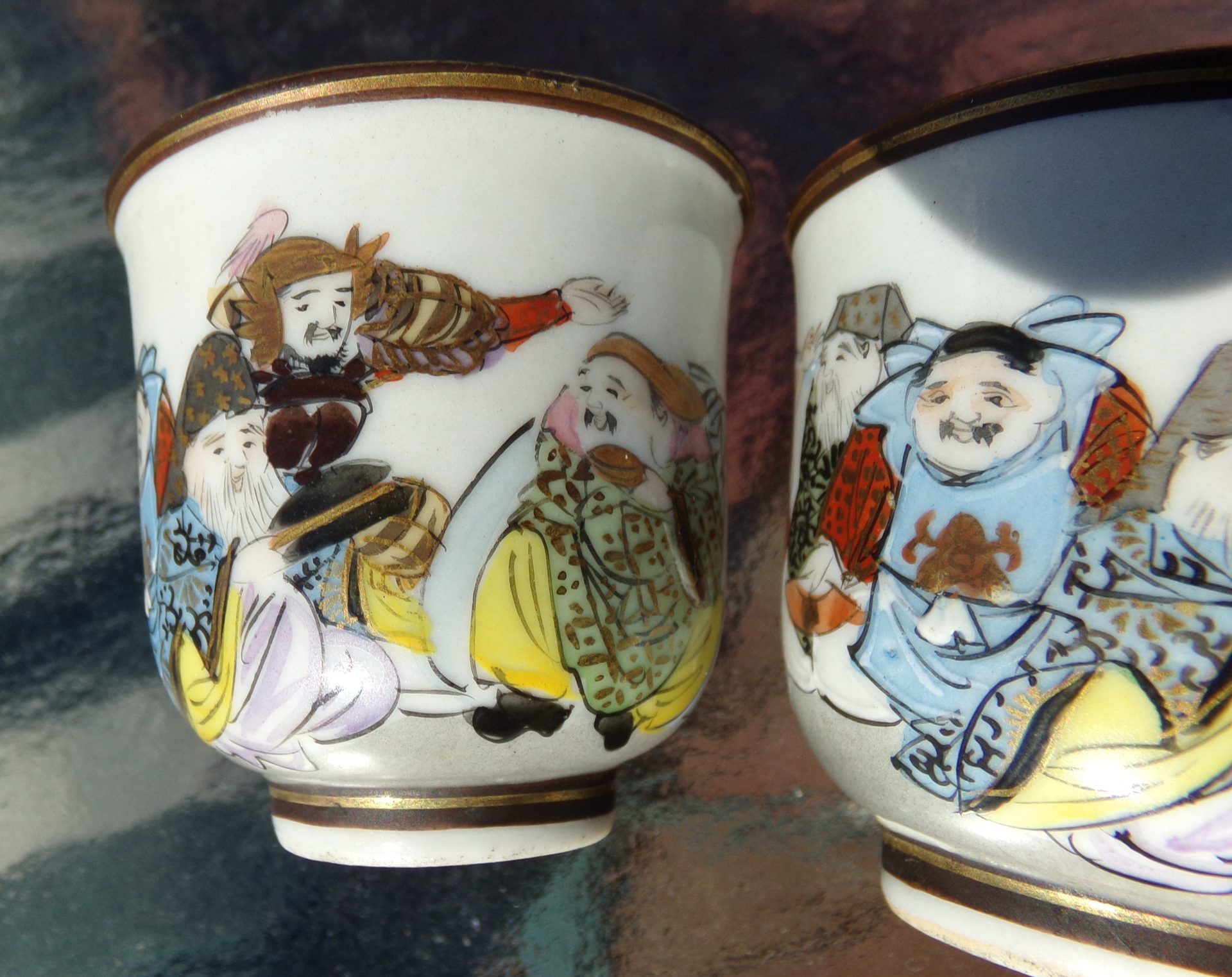 Antique Japanese Kutani Saki Cups of Seven Gods of Fortune. Signed 